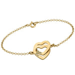 bracelet clair à deux coeurs